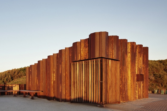 Third Wave kiosk by Tony Hobba Architects, Torquay, 2012. The building has a sculptural quality that blends into and harmonizes with the surrounding cliff environment.