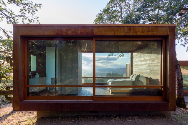  Alchemy Architects' weathered steel home, situated in California, is composed of two separate open-sided modules that were almost entirely prefabricated offsite.