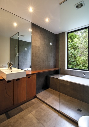 The bathroom cabinetry was designed by BOX Living.
