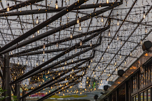 Lights are suspended along the roof canopy to create an ambient and safe atmosphere in the evening.
