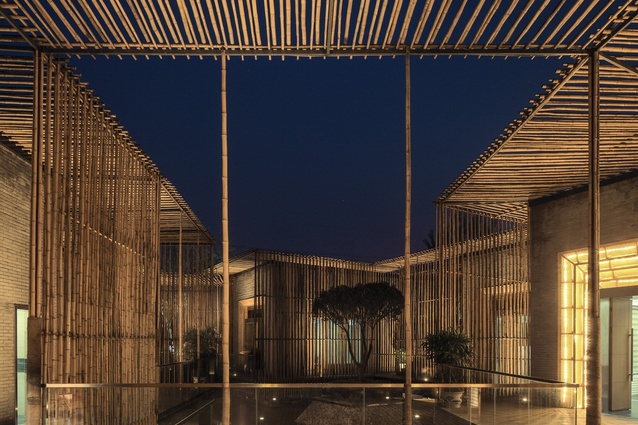 Bamboo Courtyard Teahouse, China by HWCD. This floating boutique teahouse features bamboo that is vertically and horizontally arranged for visual effect and depth.