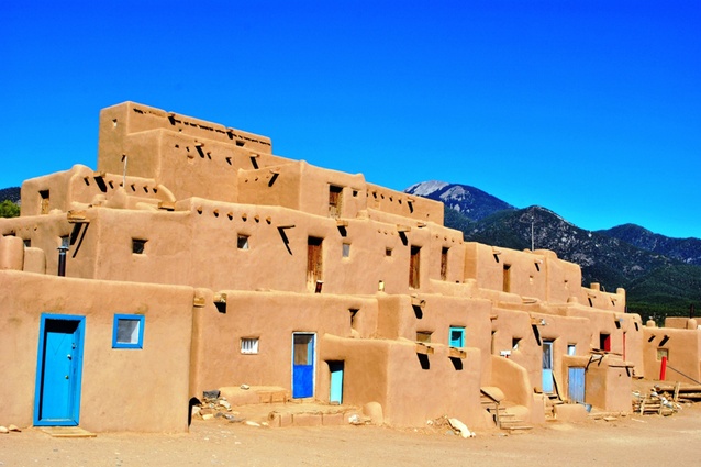 The terraced multi-storey adobe settlement of Taos Pueblo in New Mexico, USA consists of dwellings and ceremonial buildings. The modern-day Pueblo Indian people have been living in the thriving settlement since the late 13th century.