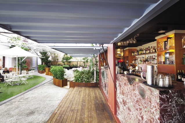 The temporary courtyard bars at the Britomart Country Club are constructed from shipping containers.