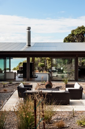 A courtyard on the leeward side of the house allows for sheltered outdoor entertaining.