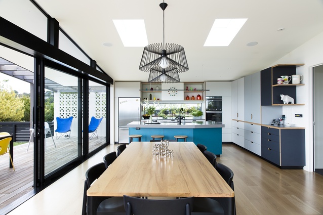 Homeowner and designer Gemma Bridges designed the kitchen and much of the furniture, including the dining table. 