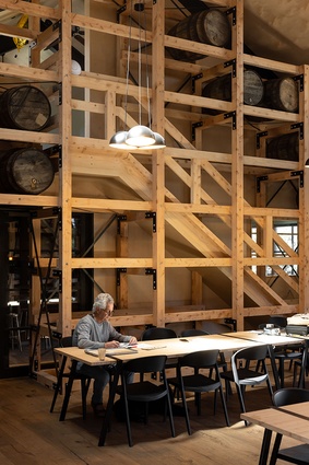 The Waiheke Whiskey Distillery & Brewery barrel room event space with hidden stairs to storage.