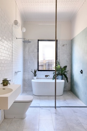 A bathroom in Garden House by BKK Architects.