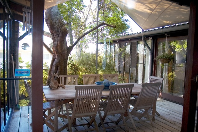 The top deck with canvas canopy overhead, viewed from the kitchen.