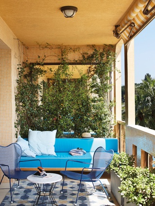 Another terrace. Bench by Humbert & Poyet; chairs by Jean Royère; side tables by Pierre Frey.
