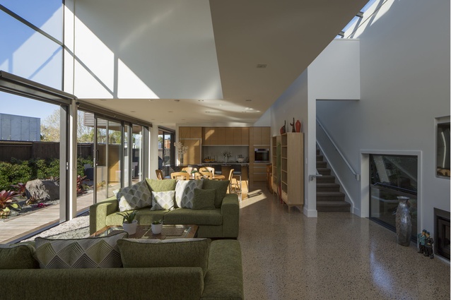 A 9m bridge-cum-balcony above the lounge provides circulation to the upper level bedrooms. 