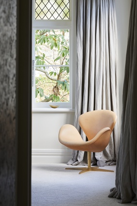 Floating curtain fabrics and carefully chosen furnishings in the Mt Eden villa.