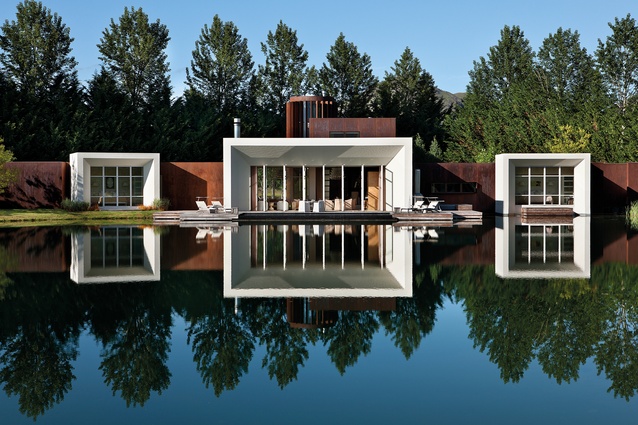 The home conjures the image of a white swan sitting on water.