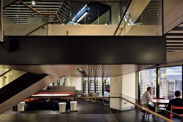 An elevation view of the new stair that links the floors and provides interaction space at ANZ. Meeting and social areas are positioned next to where the stairs intersect with the floor plate. These “hubs” have a variety of  configurations.