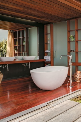 As with the existing architecture, the bathroom features bold lines.