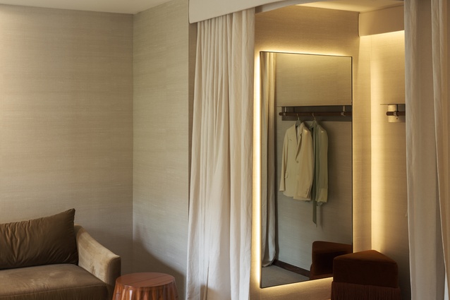 Soft, natural light frames the changing rooms. 