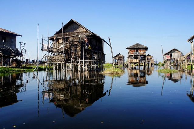 A traditional floating village composed of stilt houses on Inle lake in Myanmar. Made of wood and woven bamboo, many of these homes are surrounded by floating gardens. Everything here is undertaken by boat.