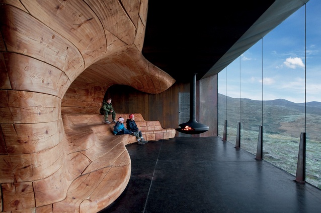 Tverrfjellhytta, the Norwegian Wild Reindeer Pavilion, designed by Snøhetta, at Hjerkinn, has a wooden core shaped like rock or ice eroded by natural forces.