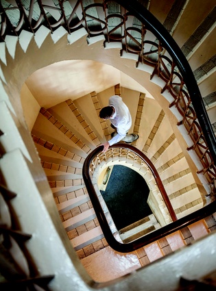 Lewis' studio is in a heritage building, the Imperial Building, which features an impressive Queen Anne staircase.