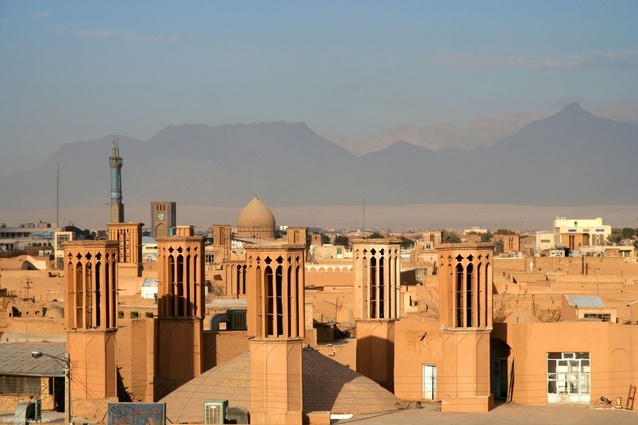 Windcatchers or <em>bagdirs</em> in Yazd, Iran. Ancient natural ventilation, these energy efficient stone structures channel wind down into a shaft which in turn cools or heats the rooms below.