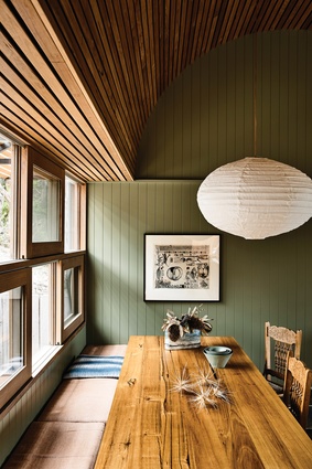 The varied volumes of the interior are unified by undulating and rolling timber ceilings.