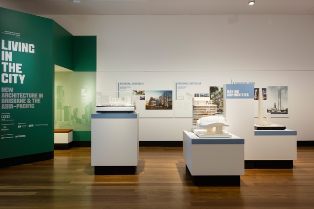 Living in the City exhibition at the Museum of Brisbane featuring models of Coorparoo Square by Conrad Gargett (left), 12 Creek Street, Brisbane City by BVN (middle), and the Chongqing IFC Tower by Woods Bagot (right).