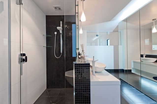 A combination of tiles were incorporated to develop sleek lines and feature areas.