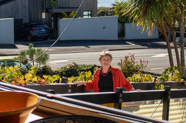 Architect Julie Stout ascends the ramp to the Narrowneck house.