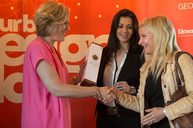 Kirsten Matthew presents a gift of Pol Roger champagne to Heba Hilali of spazioCasa and fashion designer Yvonne Bennetti.