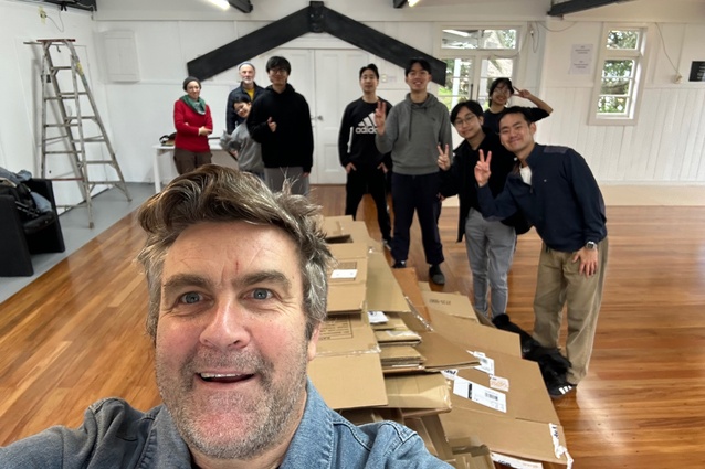 The group on day one of the build with the first cardboard stack.