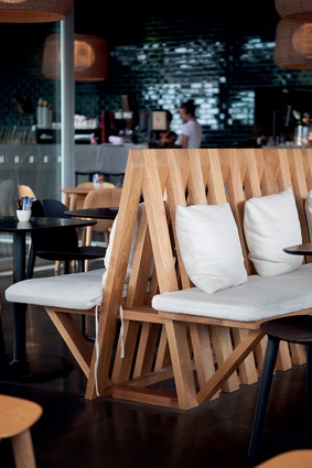 Interlocking timber seating at St Heliers Bay Cafe & Bistro by Mckinney + Windeatt Architects was a finalist in the Craftsmanship category at the 2013 Interior Awards.