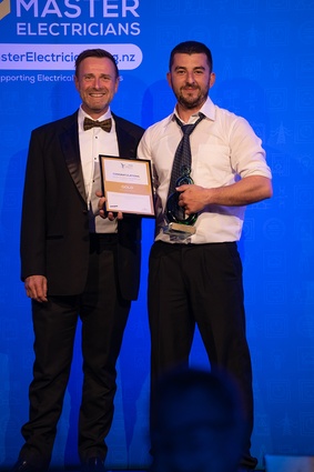 Sponsor Ronan Bowles, National Business Manager for Energizer pictured with Dalibour Jordanovski of Des Scott Electrical, winner of the Excellence in Innovation Award for the mobile seed cleaner.