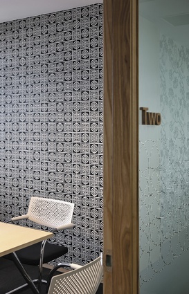 The geometric design of a Florence Broadhurst feature wallpaper.