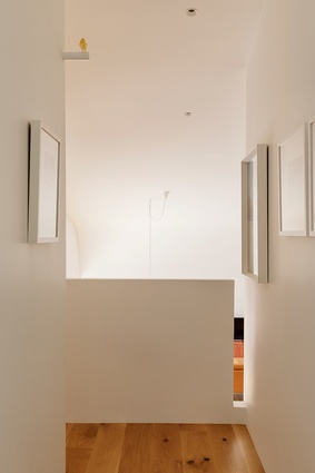 Walls create a layering of form with function, providing both privacy and a place to present art.