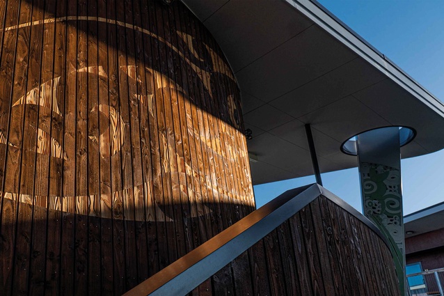Rippled designs span the Douglas fir cladding. The carved effect is a visually striking result of collaboration between TOA and an industrial design team.