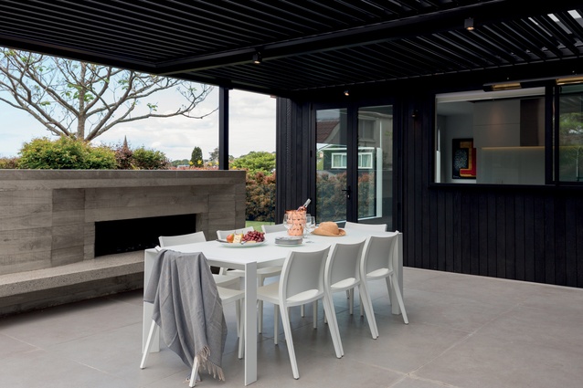 The galley kitchen overlooks the patio.
