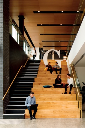 The bleacher stair/seating at 12 Madden Street connects the flexible exhibition space on the ground floor to the 300-person event space on level one. The seating can also be used as an area for presentations, with projector capabilities below.