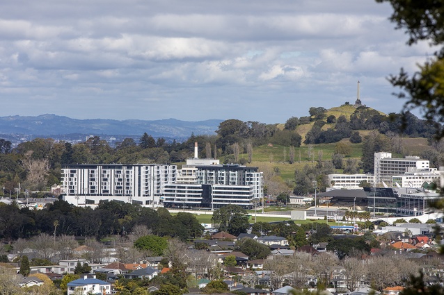 Looking across the racecourse from the north to the three apartment blocks and Maungakiekie in the background.