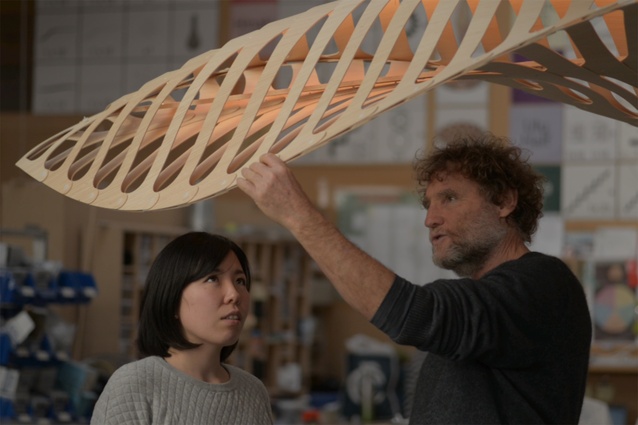 Designer Makiko Smith (pictured left) discusses the light form with David Trubridge.