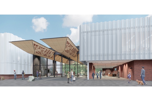 The form of Te Unua, the double hulled waka, sits between the Exhibition Hall and the Pavilion building.