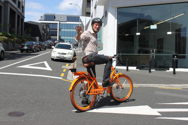 Jerome Partington on one of the Jasmax Auckland office's e-bikes.