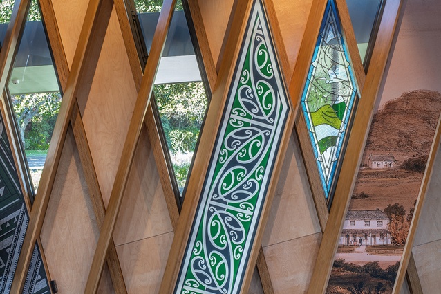 Layers of materials and contrasting panels exhibit the story of the church and Ngāti Te Whiti.