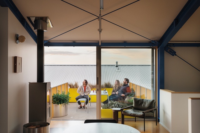 The apartment balcony floats out between street and green space, on a marooned pre-cast panel, encapsulating the notion of the stranded urban dweller.