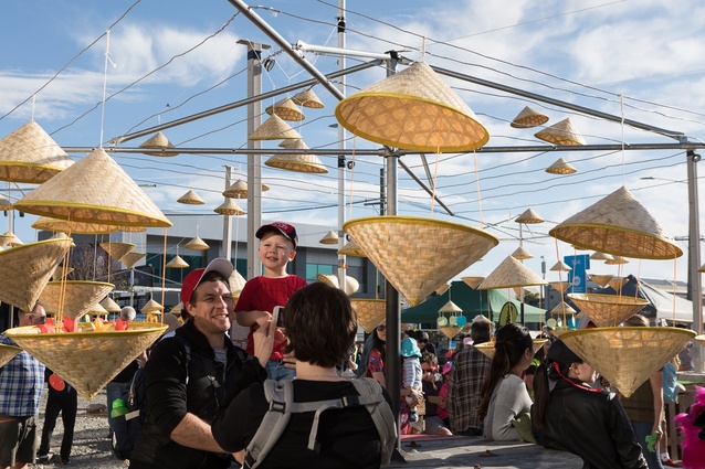 The Little Asia food market and cultural performance area was framed by the University of Adelaide’s installation, which made use of Hills Hoist clotheslines and hats for lanterns.