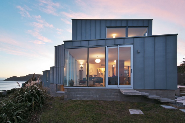 Exterior view of the zinc-clad house perched high above Island Bay.