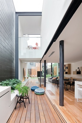 <a href="http://urbismagazine.com/articles/victorian-redux/" target="_blank"><u>Victorian Villa</u></a>. The central courtyard introduces plenty of light and becomes a passage between old and new.  