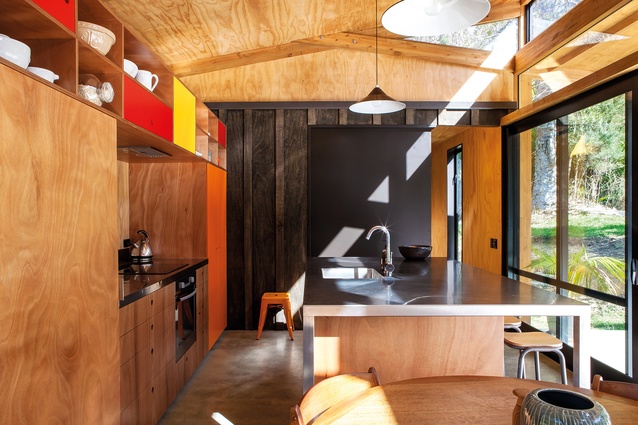Splashes of colour, natural timber and exterior cladding in the interior of the Easterbrook House.