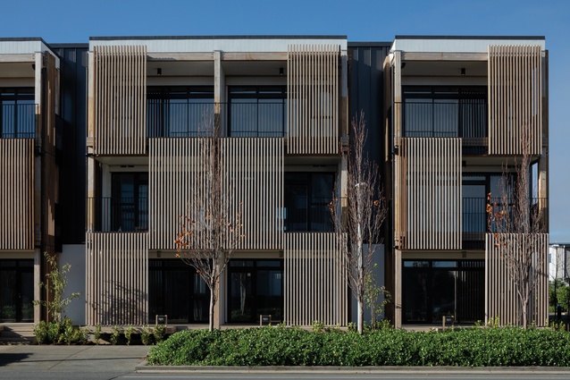 The Grounds in Hobsonville is a multi-unit housing development and is over three storeys, built of prefabricated, engineered tall timber.