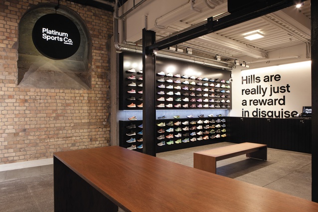 Platinum Sports, a new boutique sports shop at Victoria Park. Products are organised around discreet signage that foregoes the usual visual clutter of brand-referencing signage.