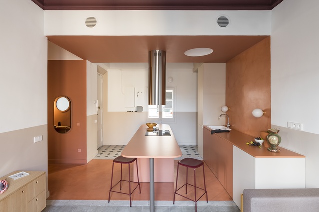 Monochrome: This small historic Barcelona apartment by Colombo & Serboli perfectly exemplifies the monochrome trend without taking it to the extreme. The use of a dusty red hue to colour the kitchen not only brings the interior design firmly into the 21st century but it assists with zoning by providing a visual anchor for the scheme. 