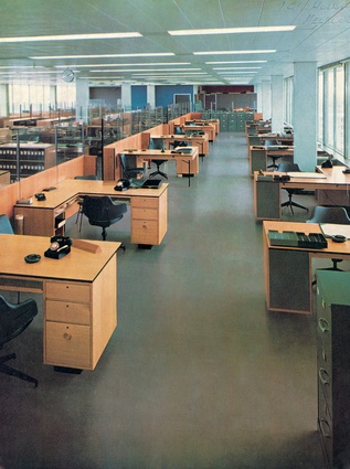 Large floor plates, use of glass and lines of workstations at the ICI House office building in Melbourne, 1958.